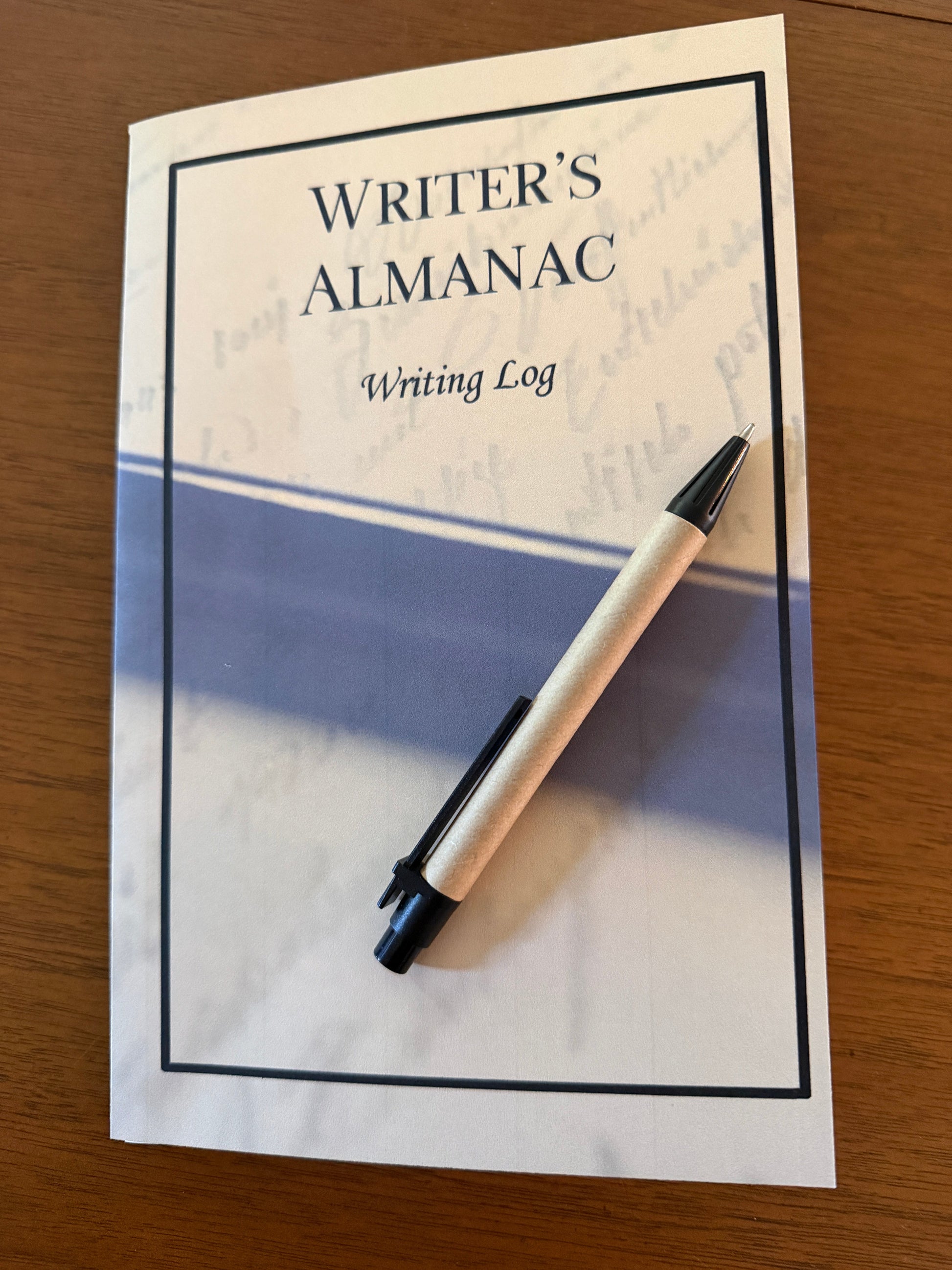 Writer's Almanac writing log with pen on it